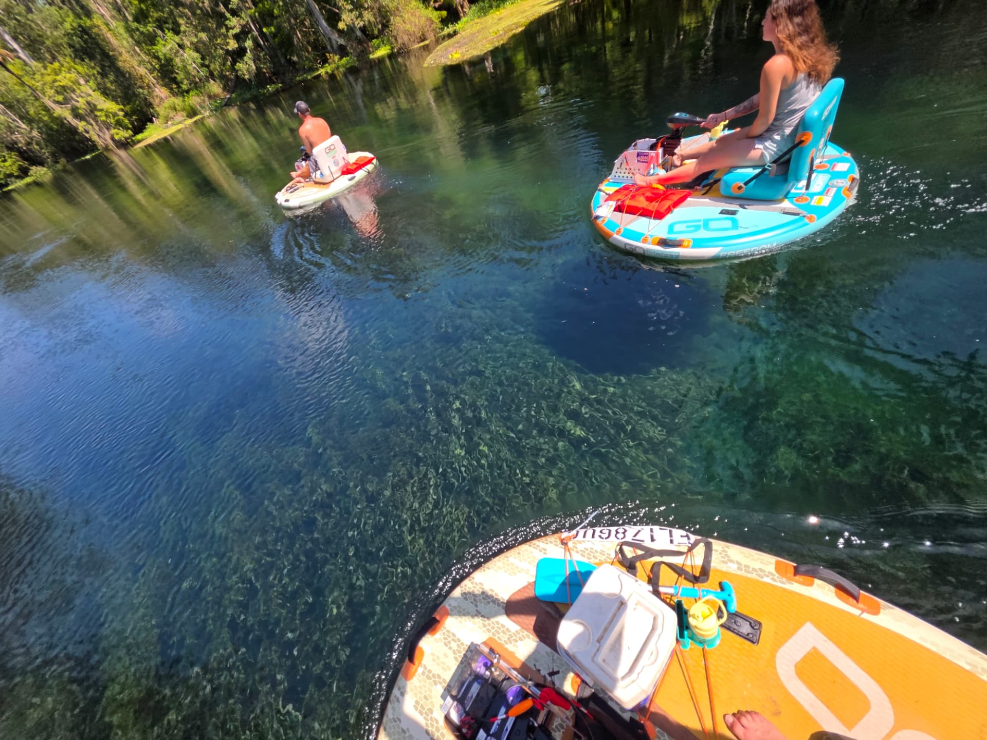 Group of GoBoats gliding over the crystal-clear Silver River