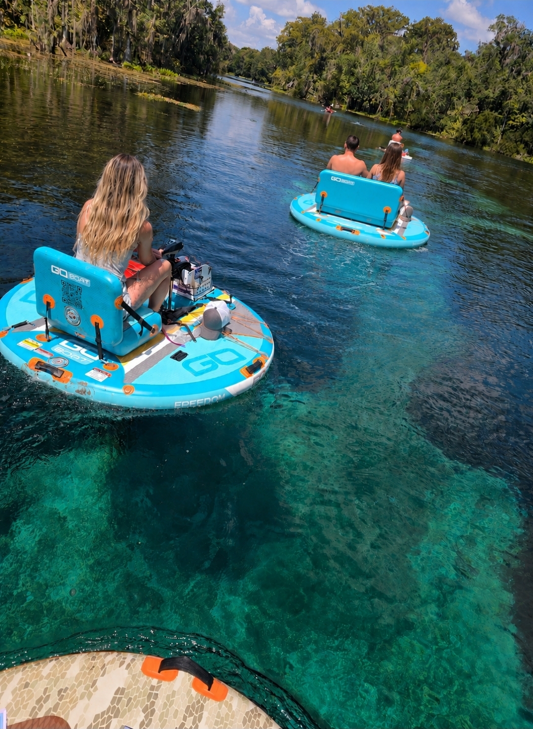 Group of GoBoats cruising the crystal-clear Silver River